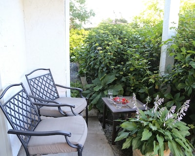 House And Garden By The Ocean And A Castle